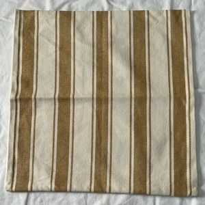 Pottery Barn 24x24 zipper pillow cover. Colors are cream and brushed gold.